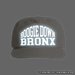 Boogie Down Bronx Reflective Surf Cap in Bone White Front with Simulated Reflection